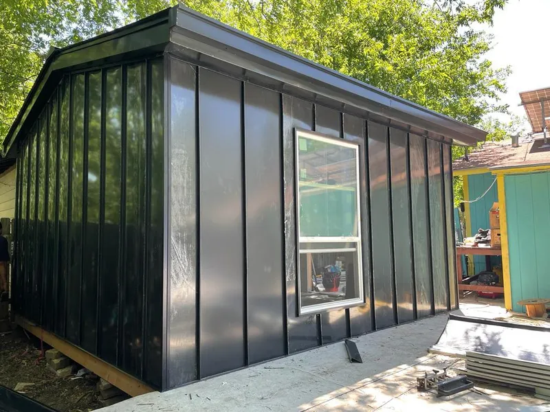 Black standing seam metal wall panels for Roof Inspection in Marcellus